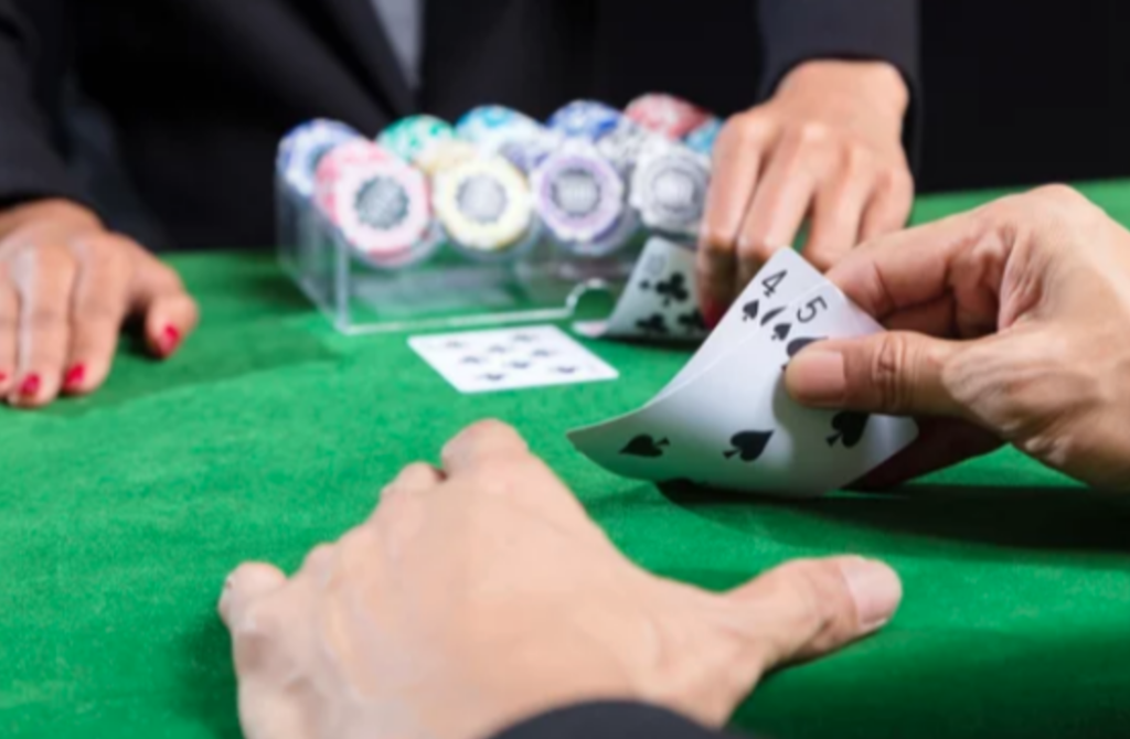 a player showing how to play baccarat using advanced strategies